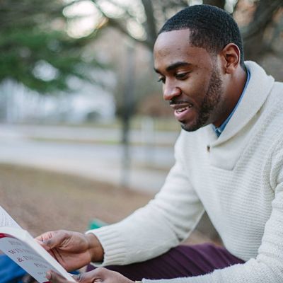 man reading a book