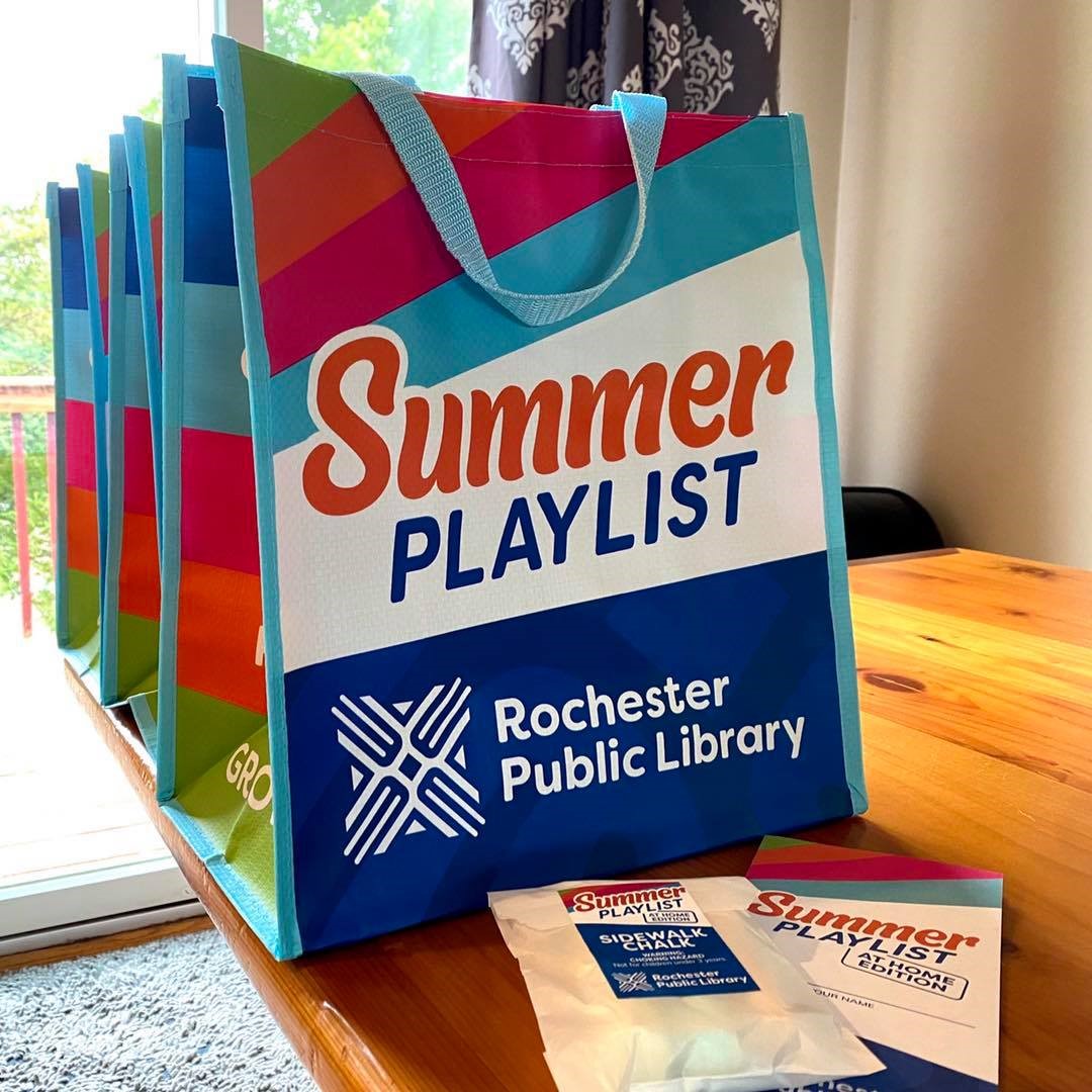 summer playlist bags on a table