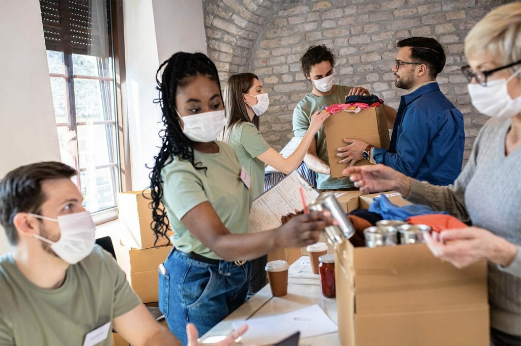 community service workers with food